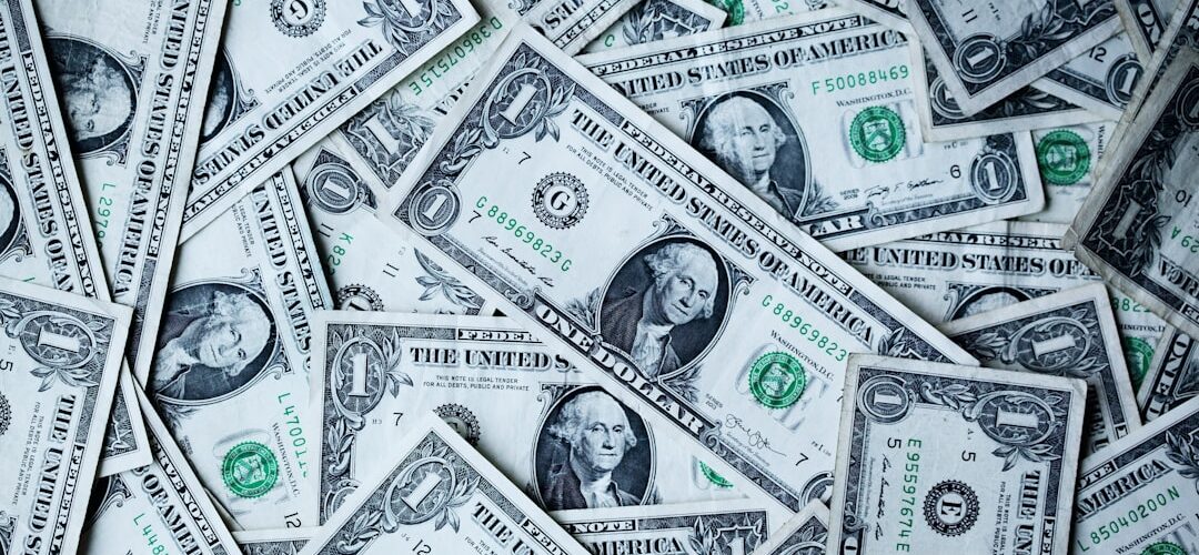 a picture of a surface covered in one dollar bills